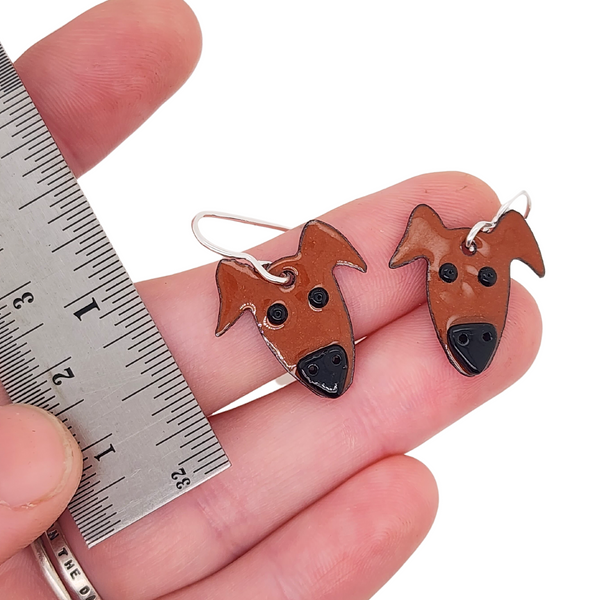 enameled earrings featuring a brown dog