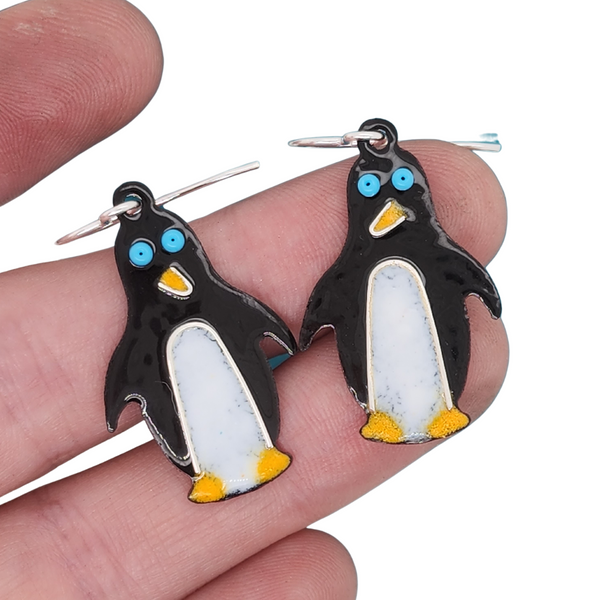 playful penguin earrings