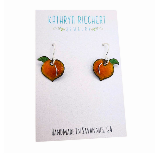 handmade earrings featuring a peach