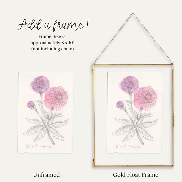 A product comparison graphic showing a Zinnia floral art print in two frame options: an unframed version on the left and a gold float frame with hanging chain on the right. Text at the top reads 'Add a frame!' and 'Frame Size is approximately 8 x 10" (not including chain)'.