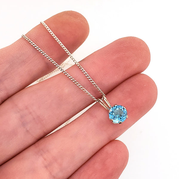 blue topaz pendant on a silver chain