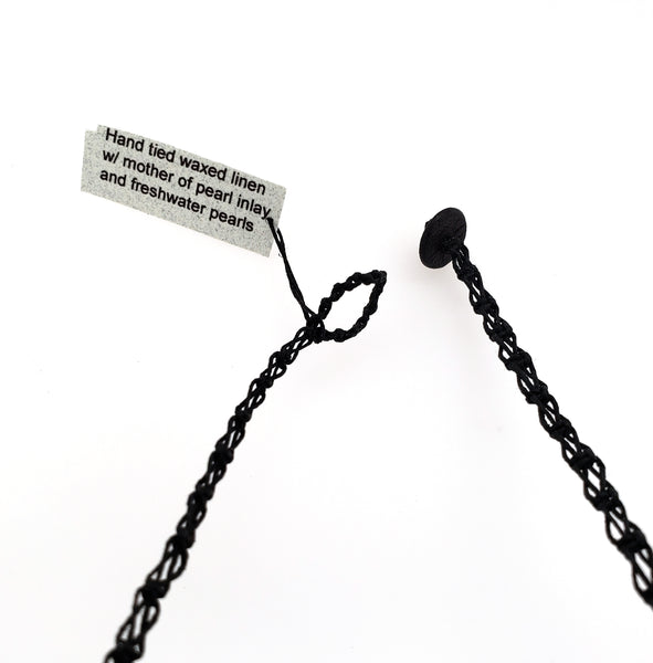 button closure on macrame necklace