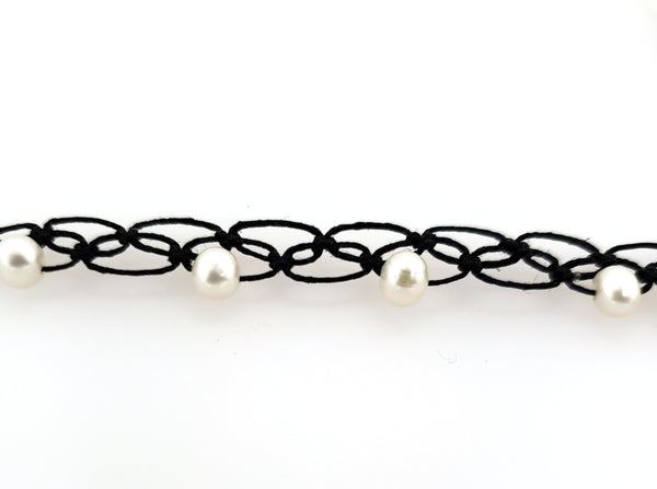 hand knotted necklace with pearls