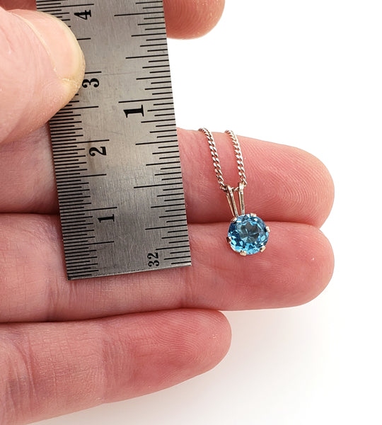 small gemstone necklace with blue topaz